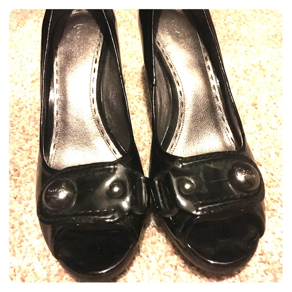 Black leather coach heels